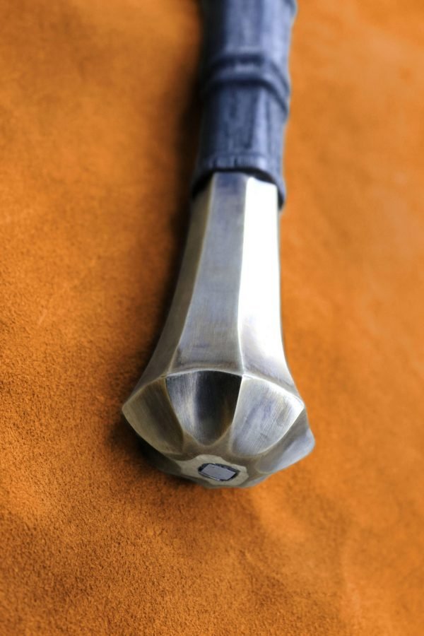 the-eindride-lone-wolf-sword-pommel the-eindride-lone-wolf-sword-pommel